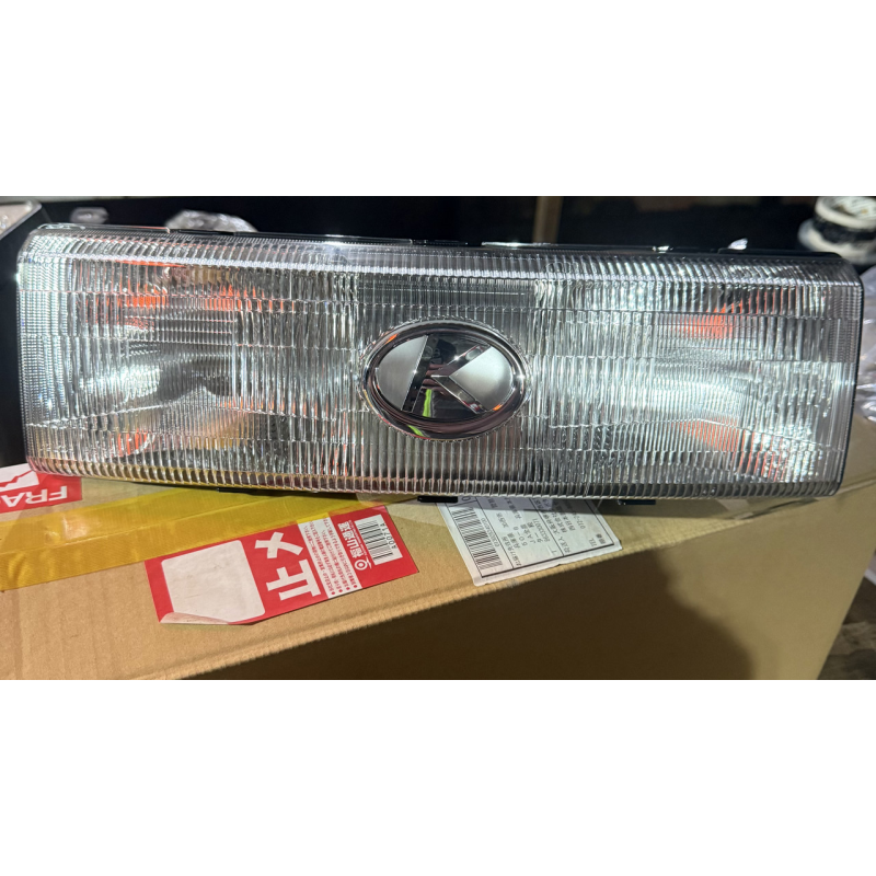 Передняя фара Kubota KL21-25 - оригинал - T1060-30010 Передняя фара Kubota KL21-25 - оригинал - T1060-30010